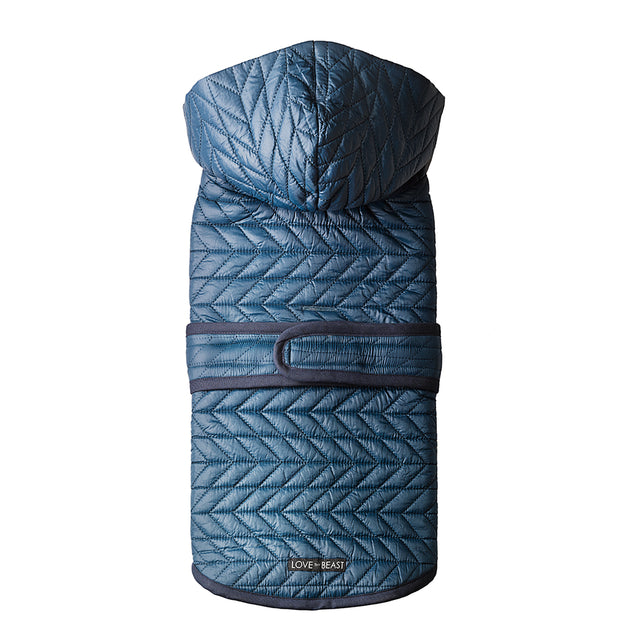 water repellent blue quilted nylon puffer dog winter jacket with a hood and harness hole opening