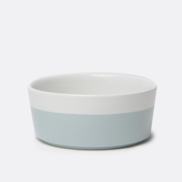 chic white durable ceramic dog bowl with light blue hand dipped bottom