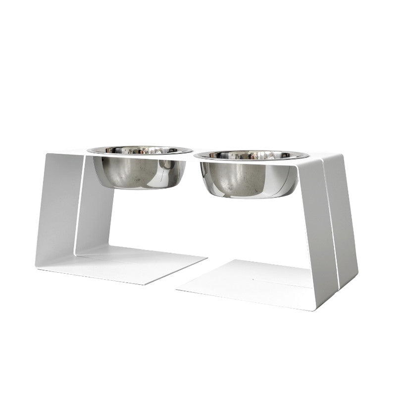 modern designer elevated pet food stand in white with two stainless steel bowls and silicone bumpers
