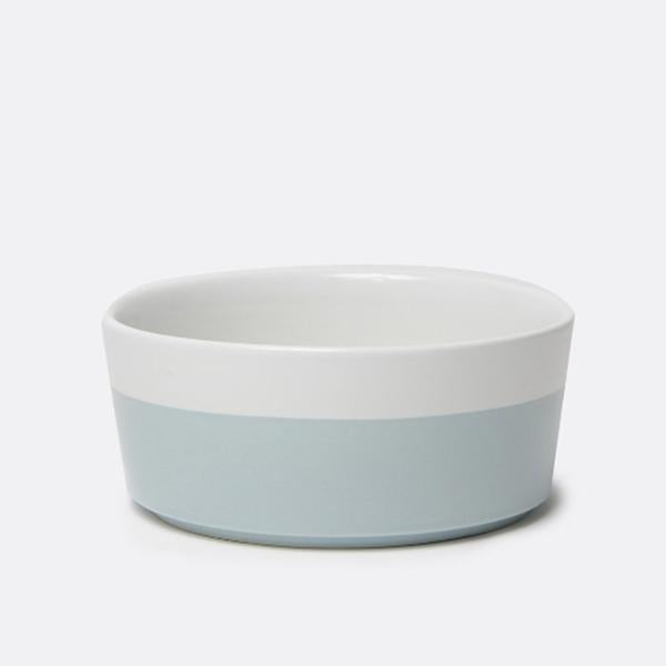 chic white durable ceramic dog bowl with light blue hand dipped bottom 