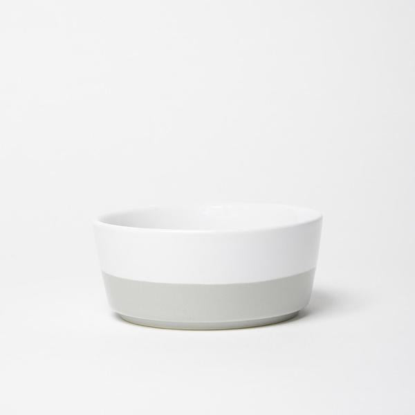 simple chic white ceramic dog bowl with light grey hand dipped bottom 