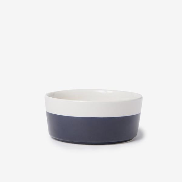 modern white microwave and dishwasher safe ceramic pet bowl with navy blue and dipped bottom